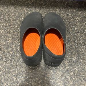Black Slip-On Crocs on the clock Literide work clogs unisex